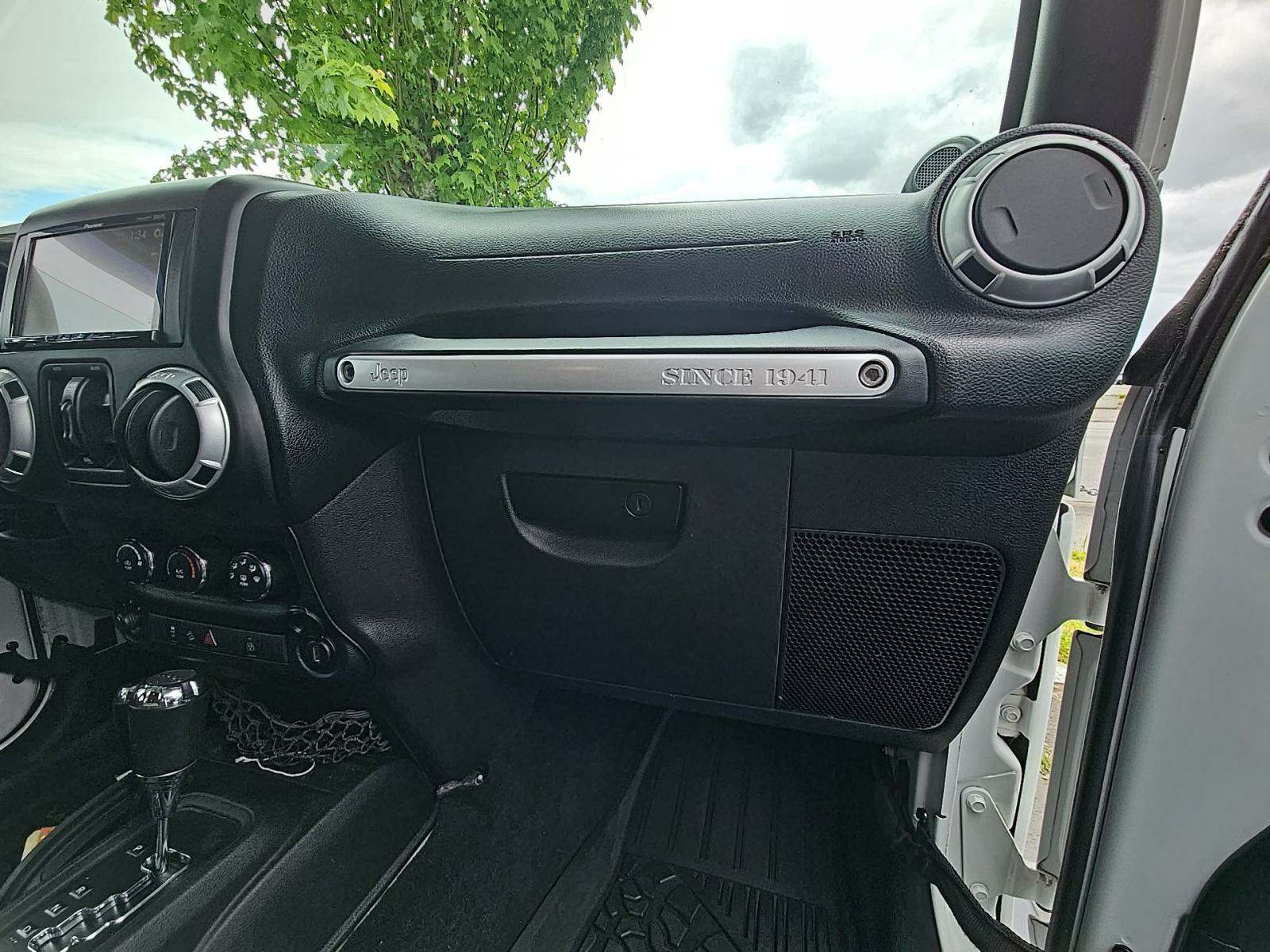 2014 Jeep Wrangler Unlimited Sahara AWD